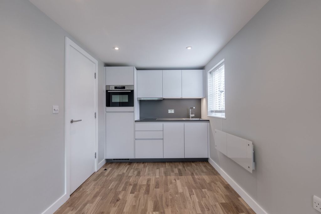 Property photo 2 of 12 Kitchen