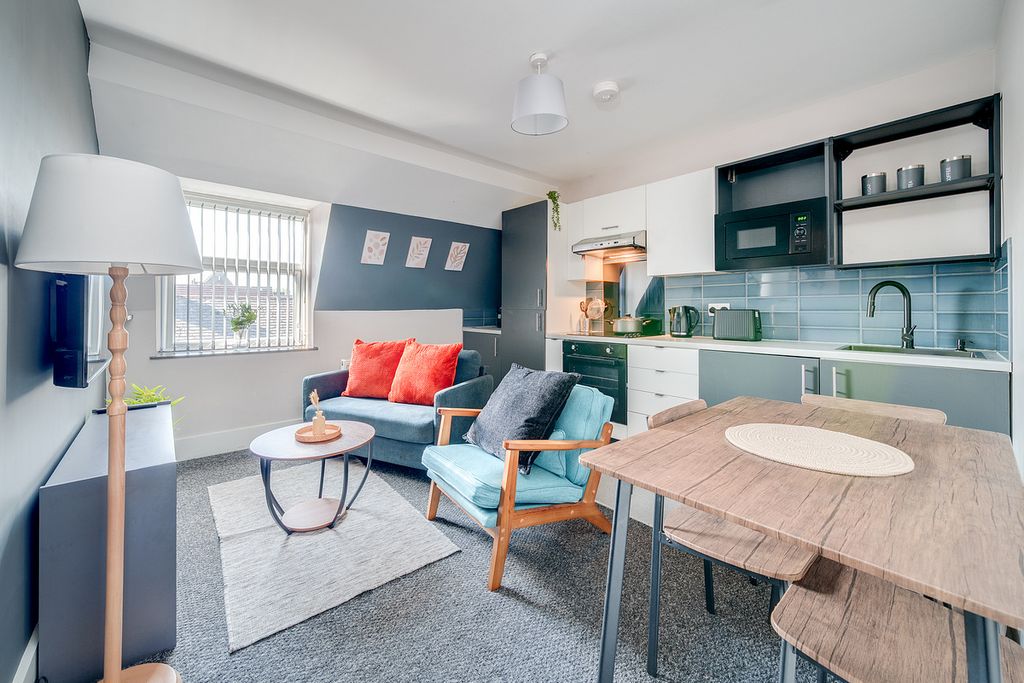 Property photo 1 of 12 Living Area & Kitchen