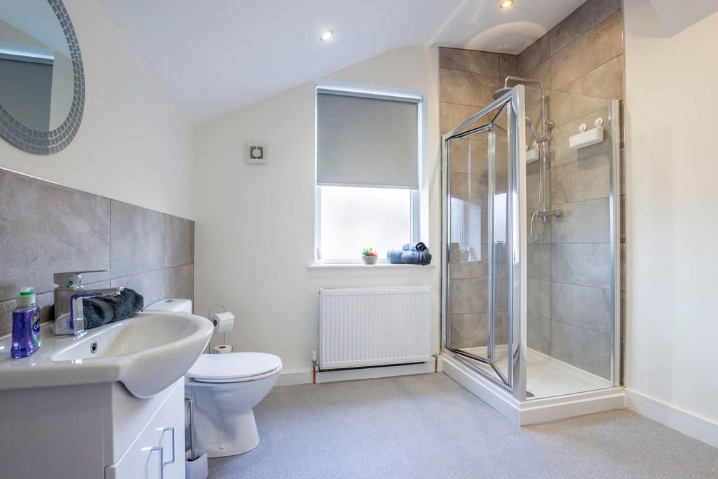Property photo 3 of 12 A Modern And Spacious Bathroom Suite Featuring A l...