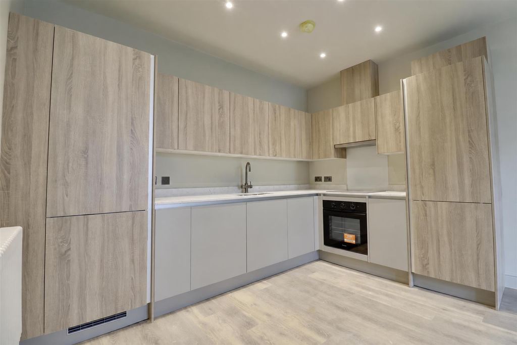 Property photo 2 of 10 Modern Light Oak L-Shaped Kitchen.Png