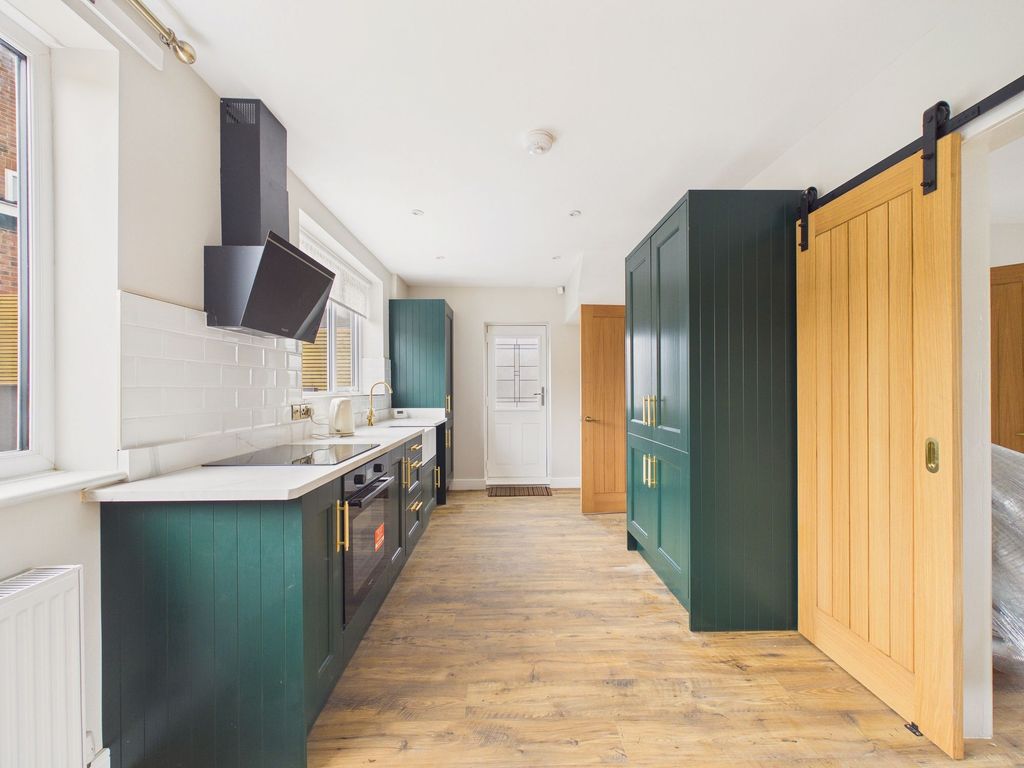 Property photo 2 of 12 Dining Kitchen