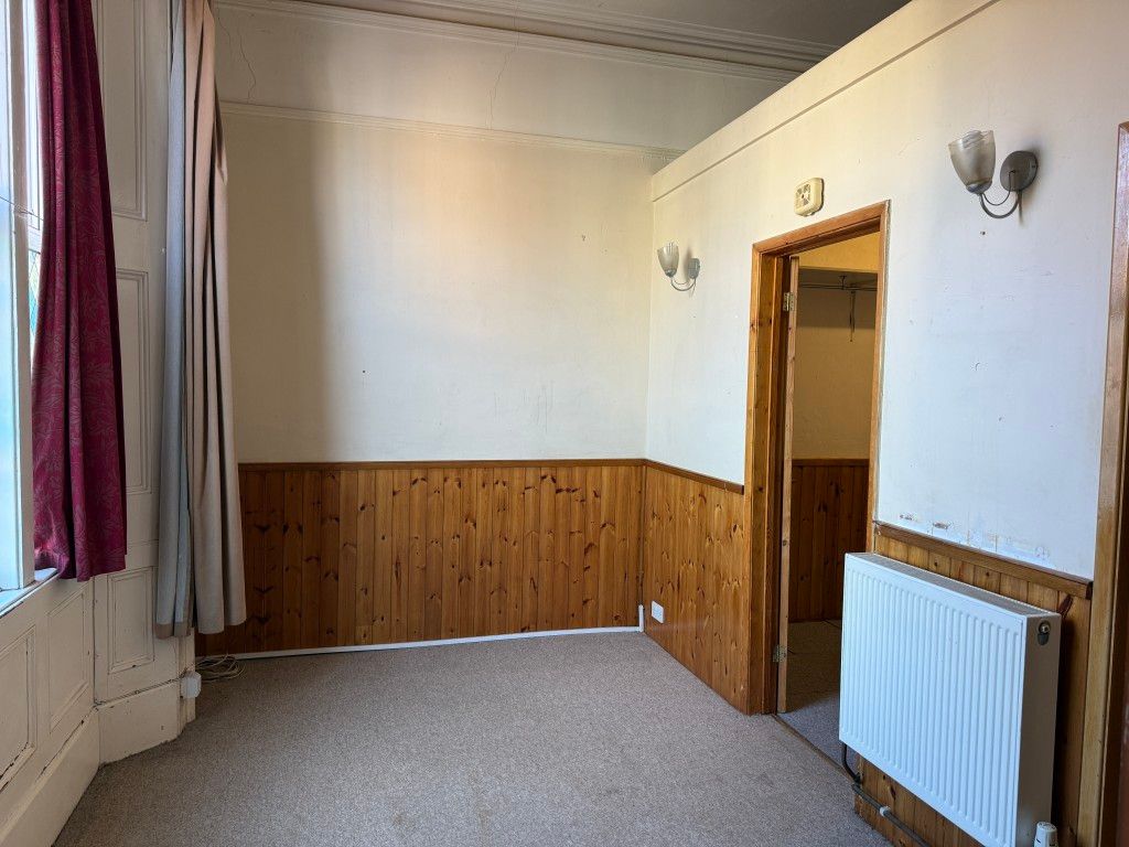 Property photo 2 of 5 Living Room Area With Wooden Wall Panels