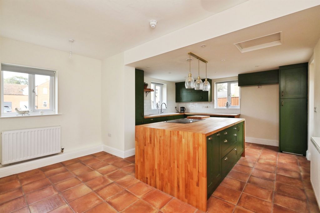 Property photo 3 of 23 Kitchen / Family Dining Room
