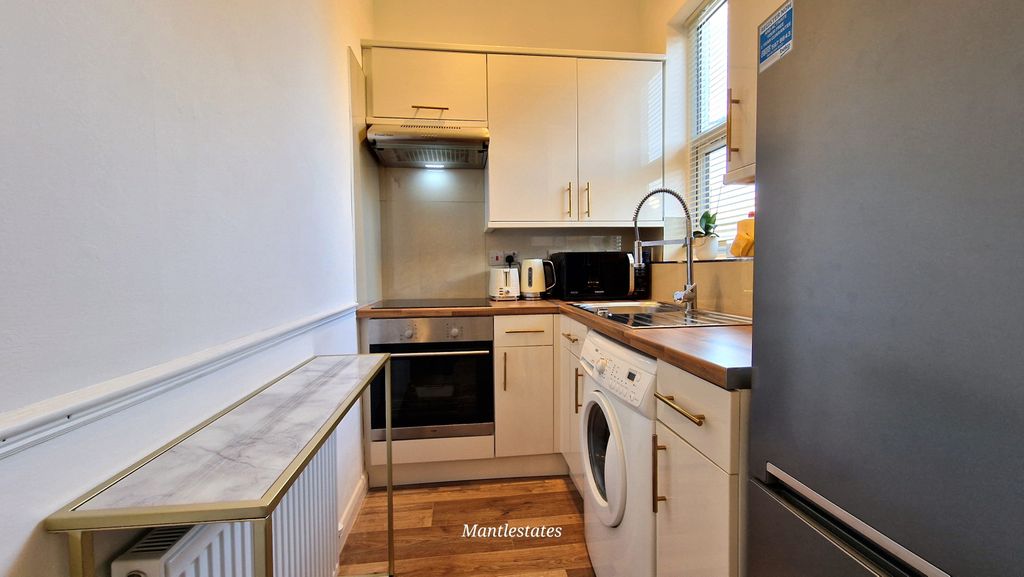 Property photo 3 of 13 Kitchen