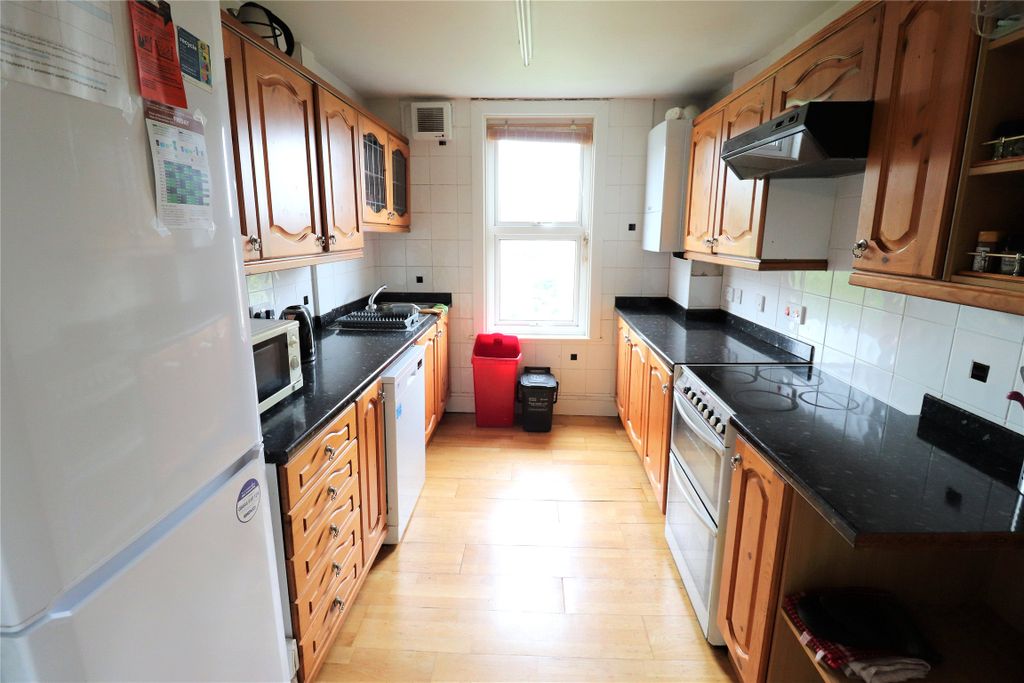 Property photo 1 of 9 Kitchen Area