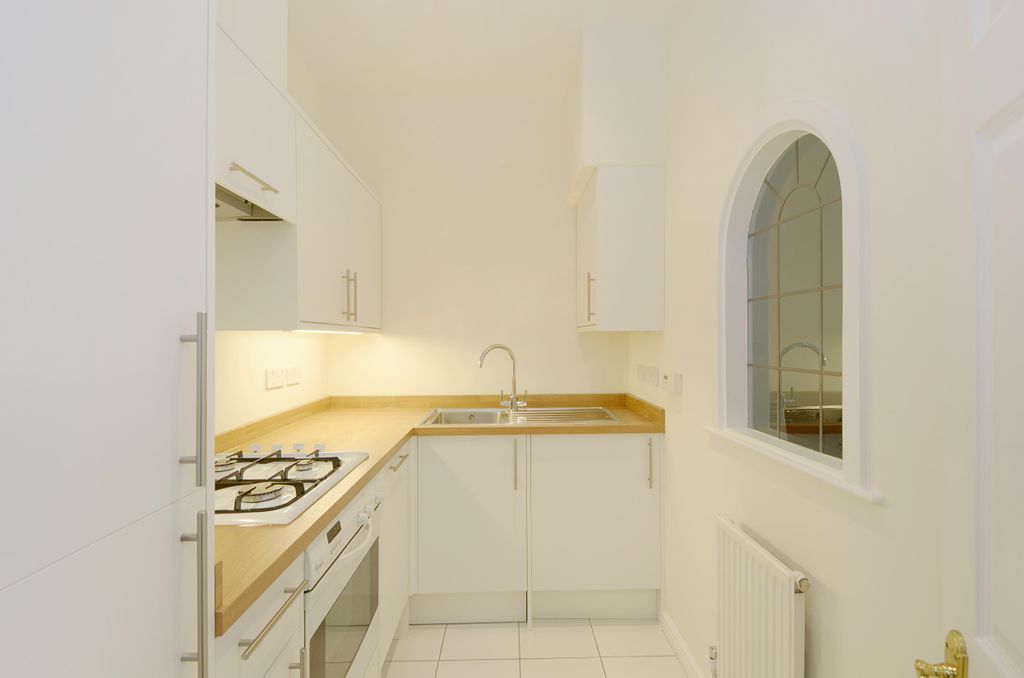 Property photo 2 of 8 Kitchen
