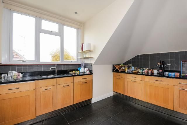 Property photo 3 of 8 Kitchen