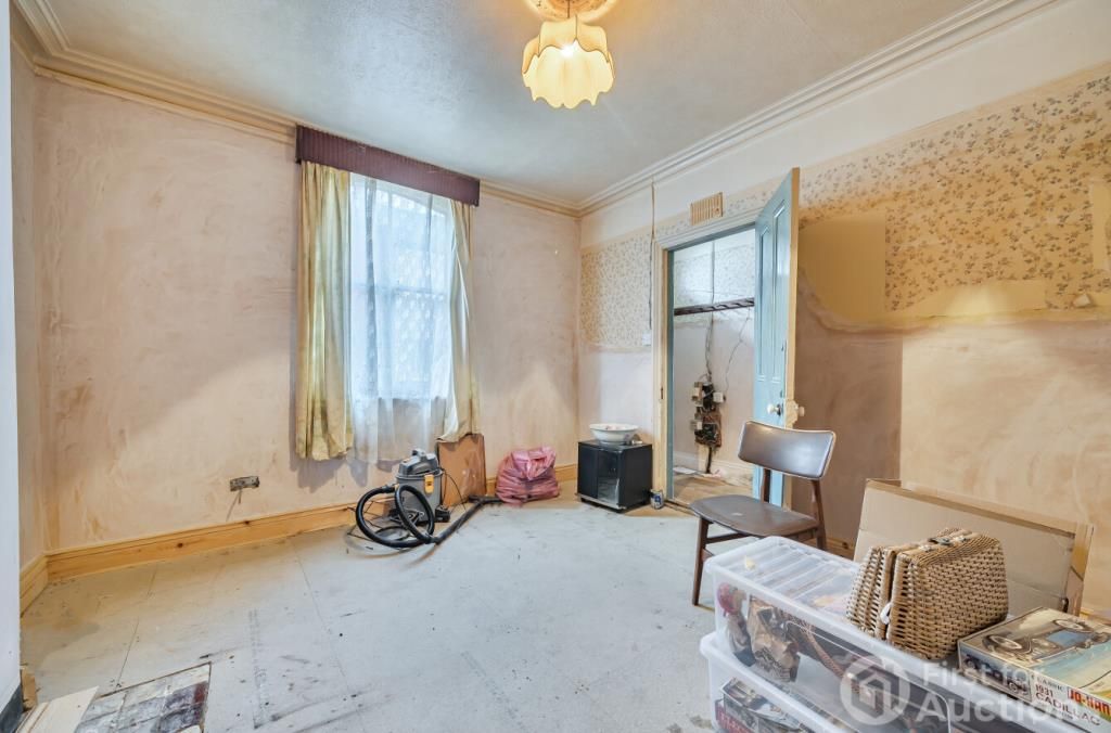 Property photo 2 of 13 Living Area