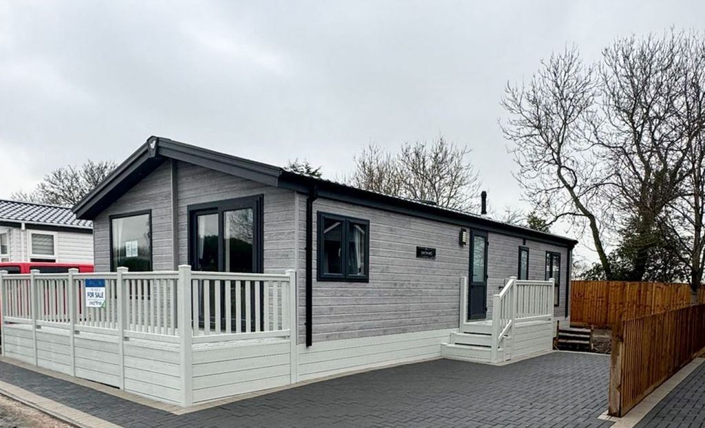 Property photo 1 of 15 Exterior Of The Willerby Haywood Lodge With Decking And Private Driveway