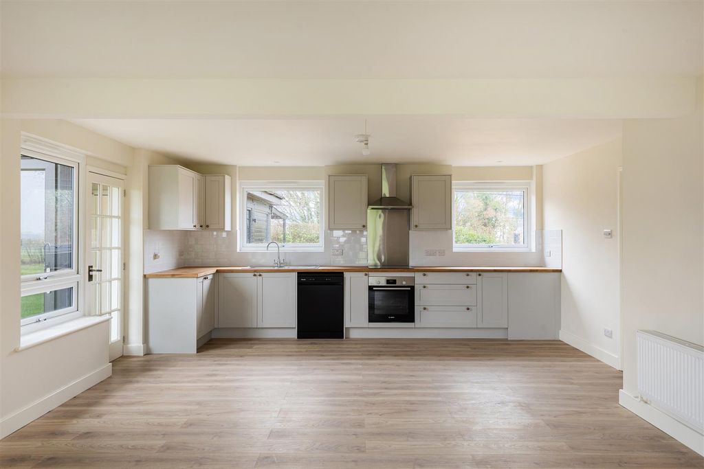 Property photo 3 of 13 Kitchen