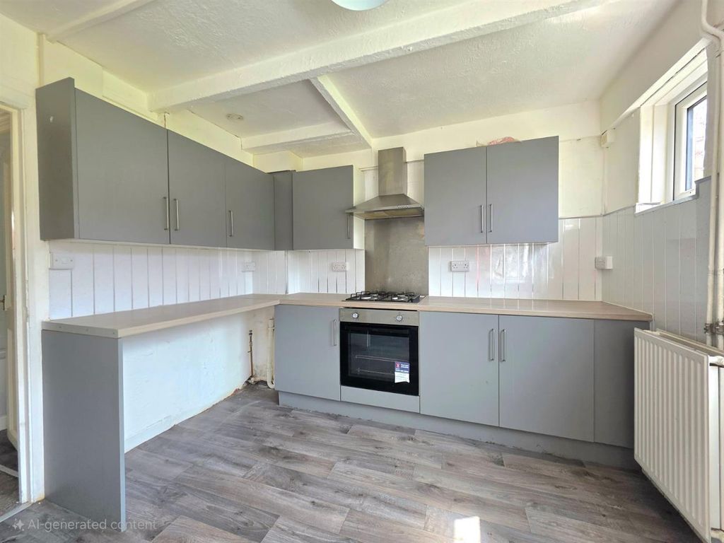 Property photo 3 of 13 Kitchen