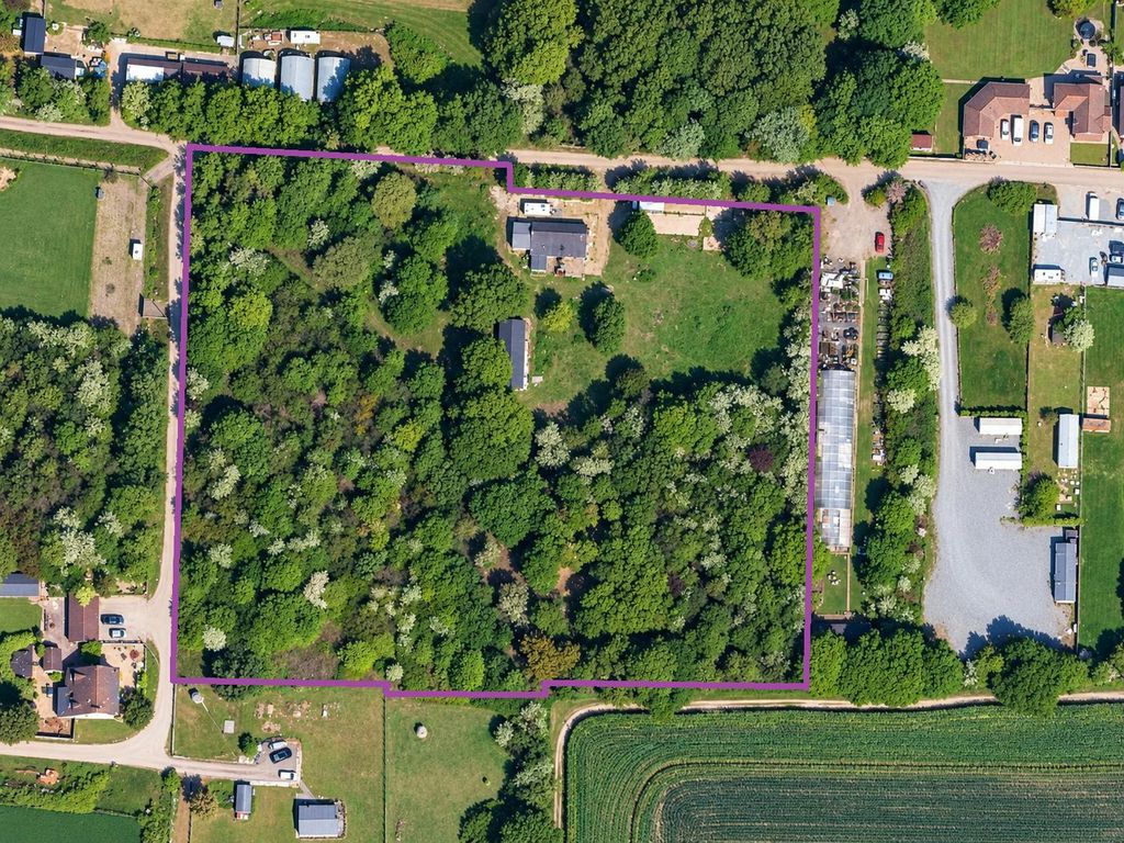 Property photo 1 of 8 Wooded Rural Property Aerial View.Png