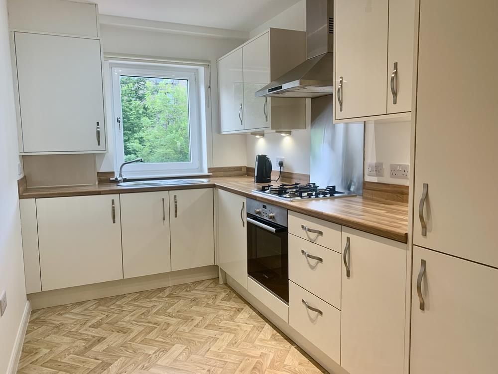 Property photo 3 of 8 Kitchen