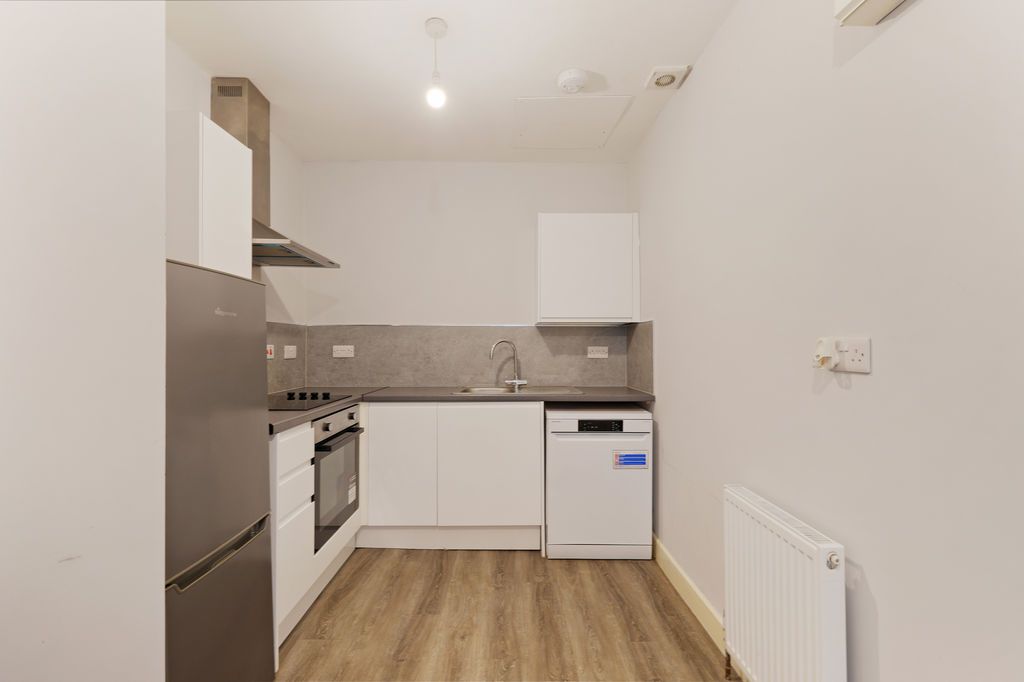 Property photo 2 of 12 Kitchen