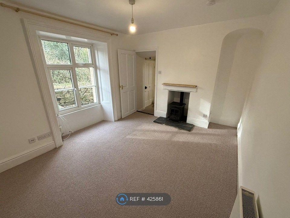 Property photo 2 of 8 Lounge With Electric Wood Burner