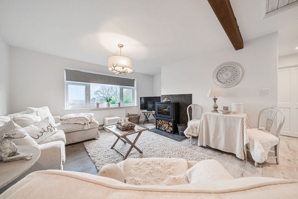 Property photo 2 of 11 Living Area