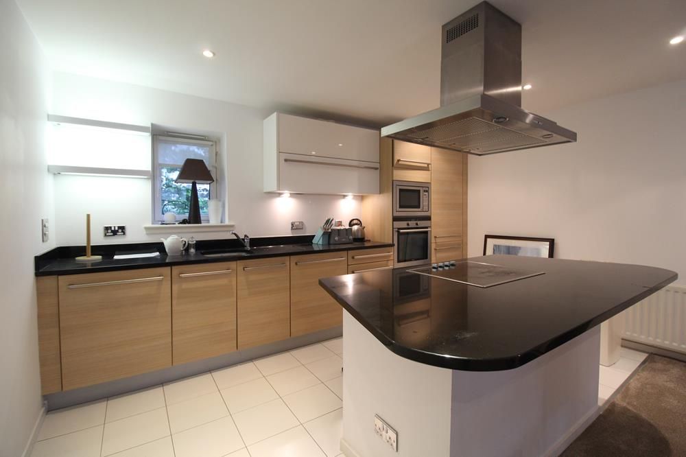 Property photo 3 of 9 Kitchen