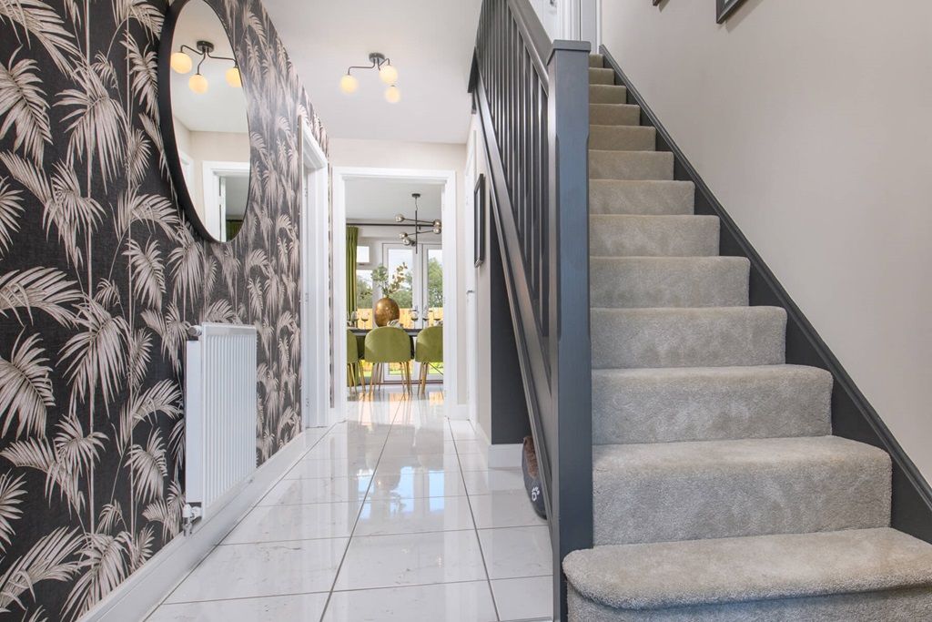Property photo 3 of 12 A Welcoming Hallway With Storage Cupboard