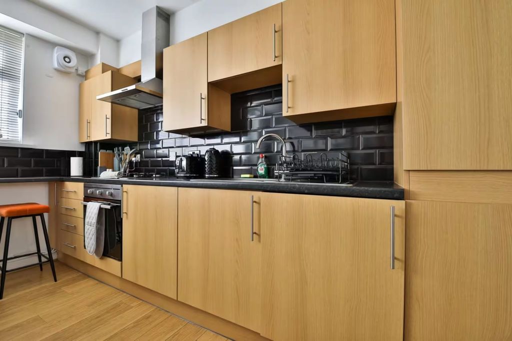 Property photo 2 of 11 Kitchen Area