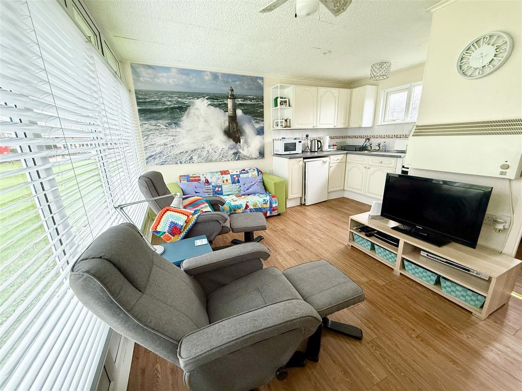 Property photo 2 of 8 Living Area