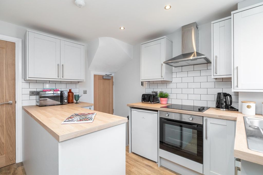 Property photo 3 of 8 Bright Modern Kitchen With Light Cabinetry, Wooden...