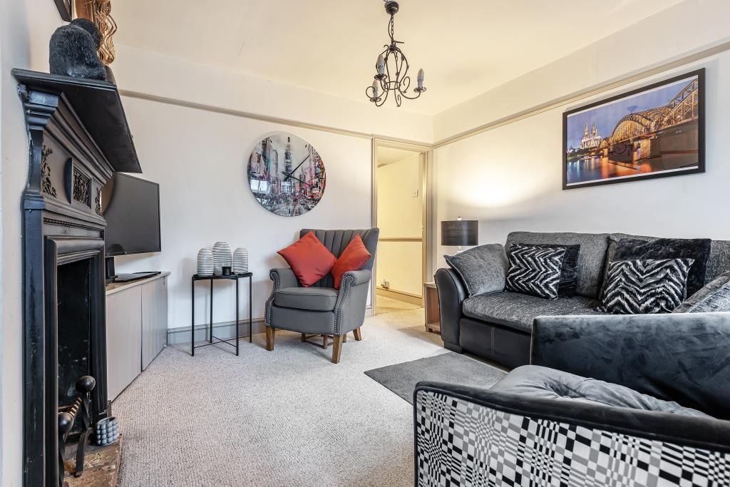 Property photo 3 of 10 Living Area