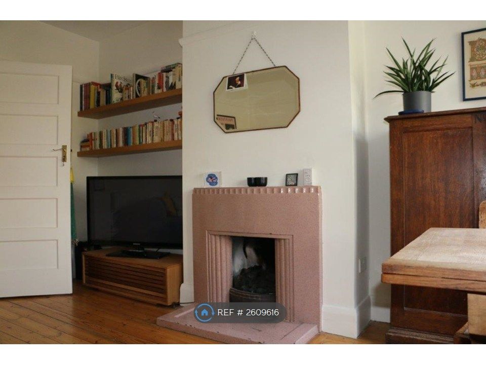 Property photo 2 of 16 Living Room With Fireplace
