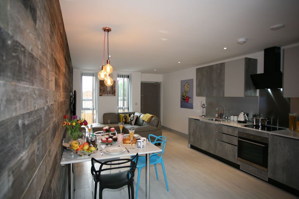 Property photo 2 of 5 A Stylish Contemporary Living Room With A Sleek In...
