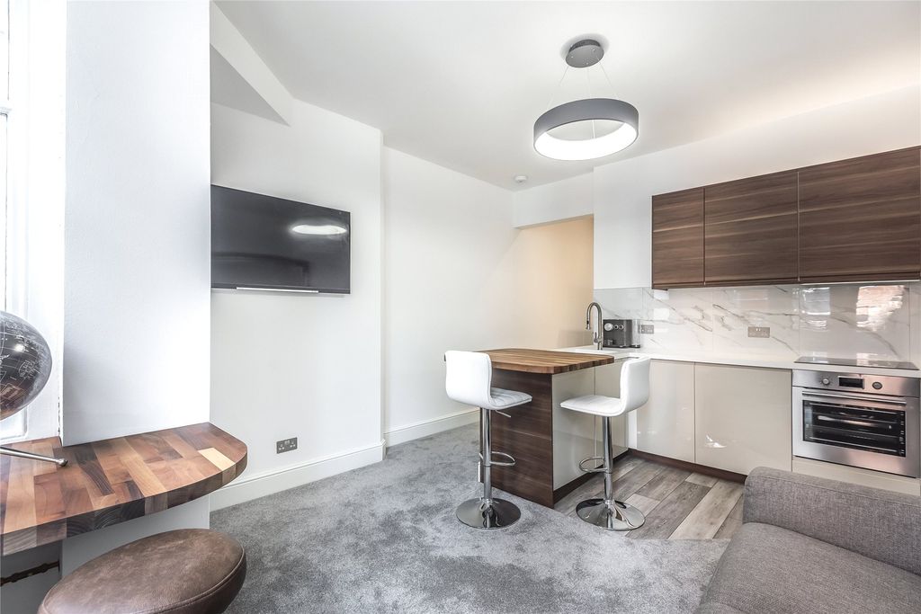 Property photo 2 of 9 Living Area