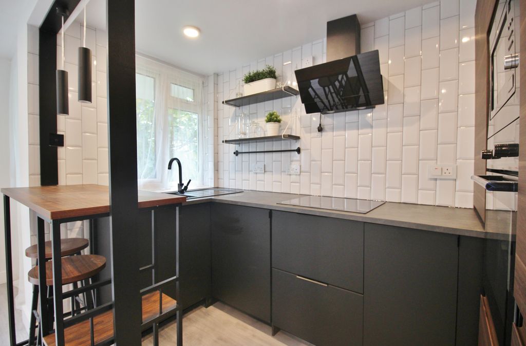 Property photo 3 of 10 Open-Plan Kitchen