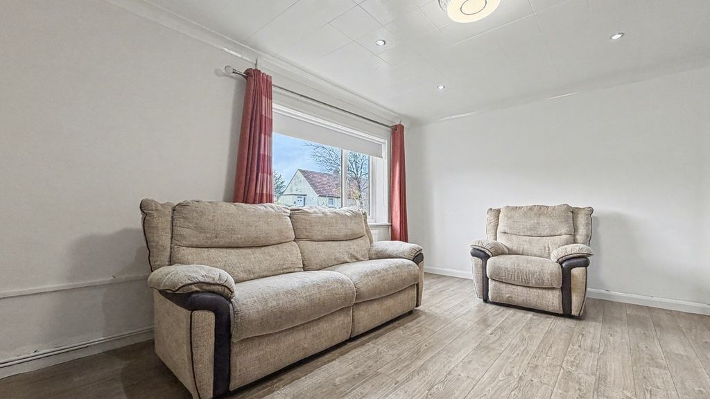 Property photo 2 of 15 Bright, Simply Furnished Living Room With A Comfor...