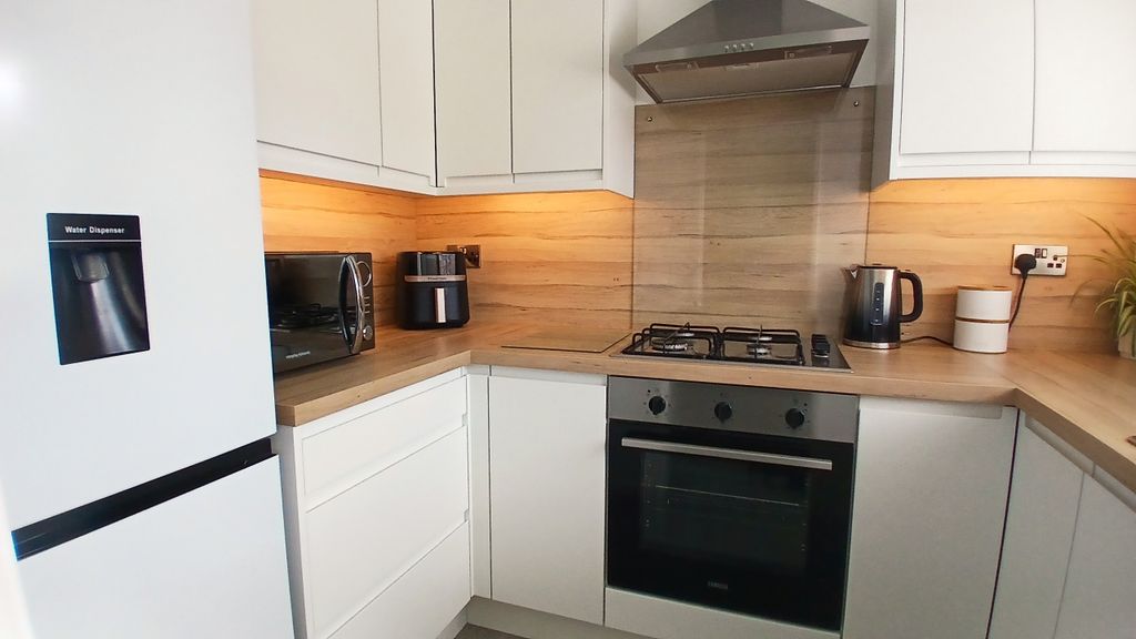 Property photo 3 of 17 3.Kitchen Two