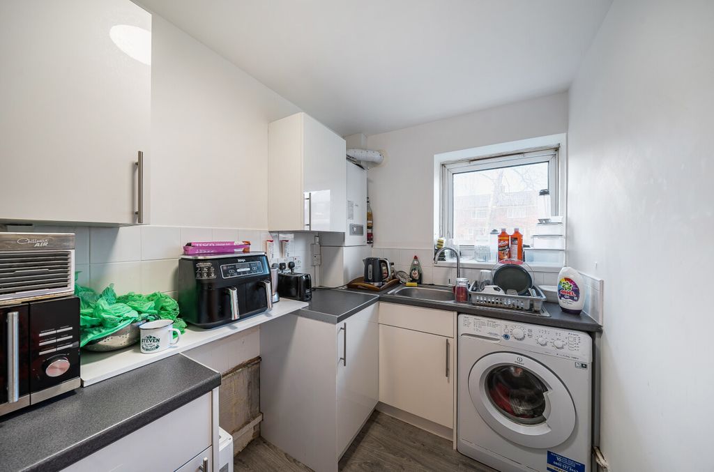 Property photo 3 of 15 1419432-10-699De3...
