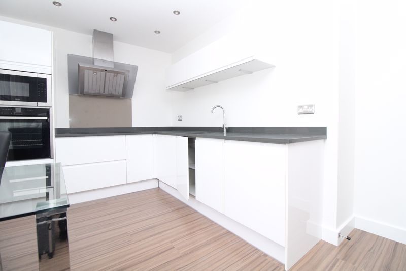 Property photo 3 of 8 Kitchen