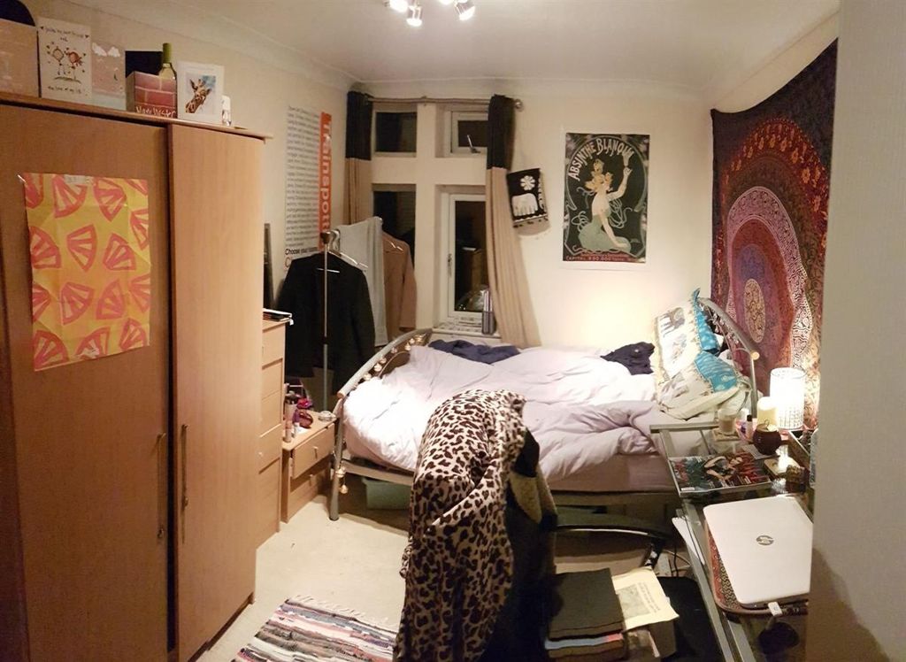 Property photo 2 of 15 A Cozy And Personalized Single Bedroom Featuring A...