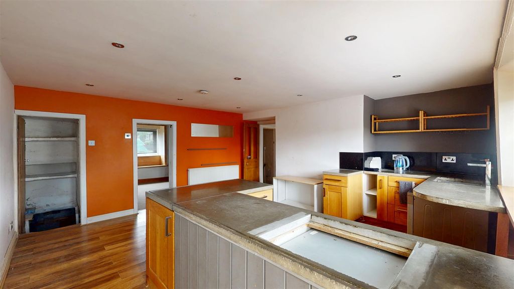 Property photo 2 of 11 Dining Kitchen