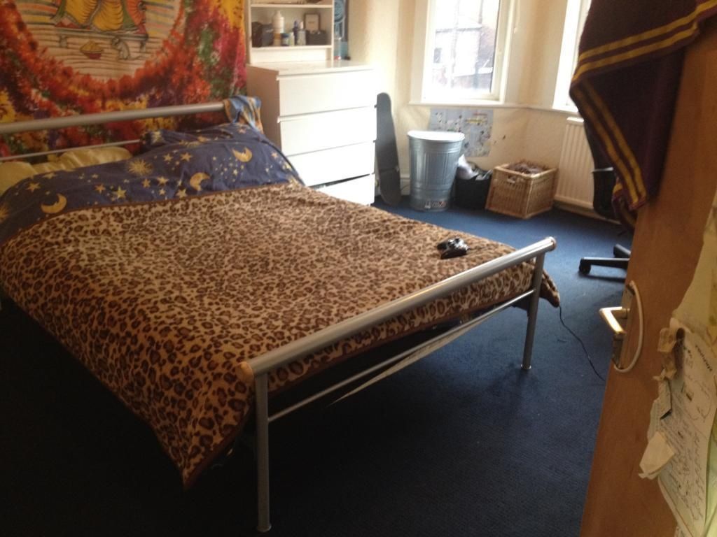 Property photo 3 of 13 A Cozy Master Bedroom Featuring A Double Bed With ...