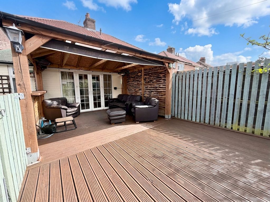 Property photo 2 of 16 Covered Seating Area