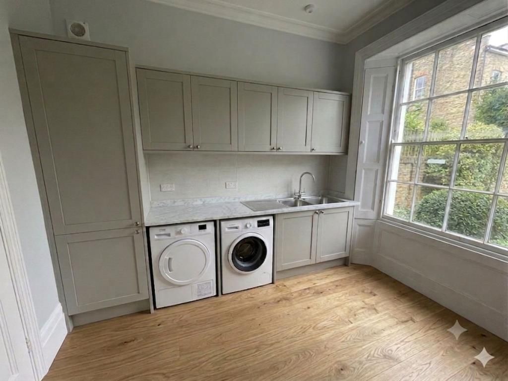 Property photo 2 of 12 Utility Room