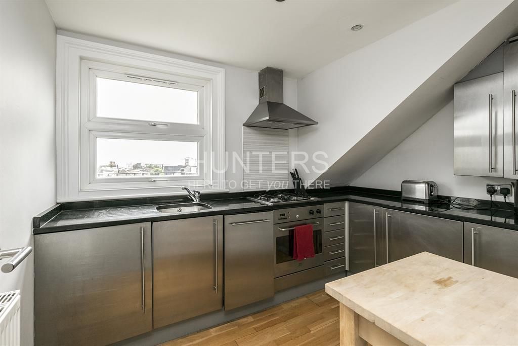 Property photo 3 of 8 Kitchen