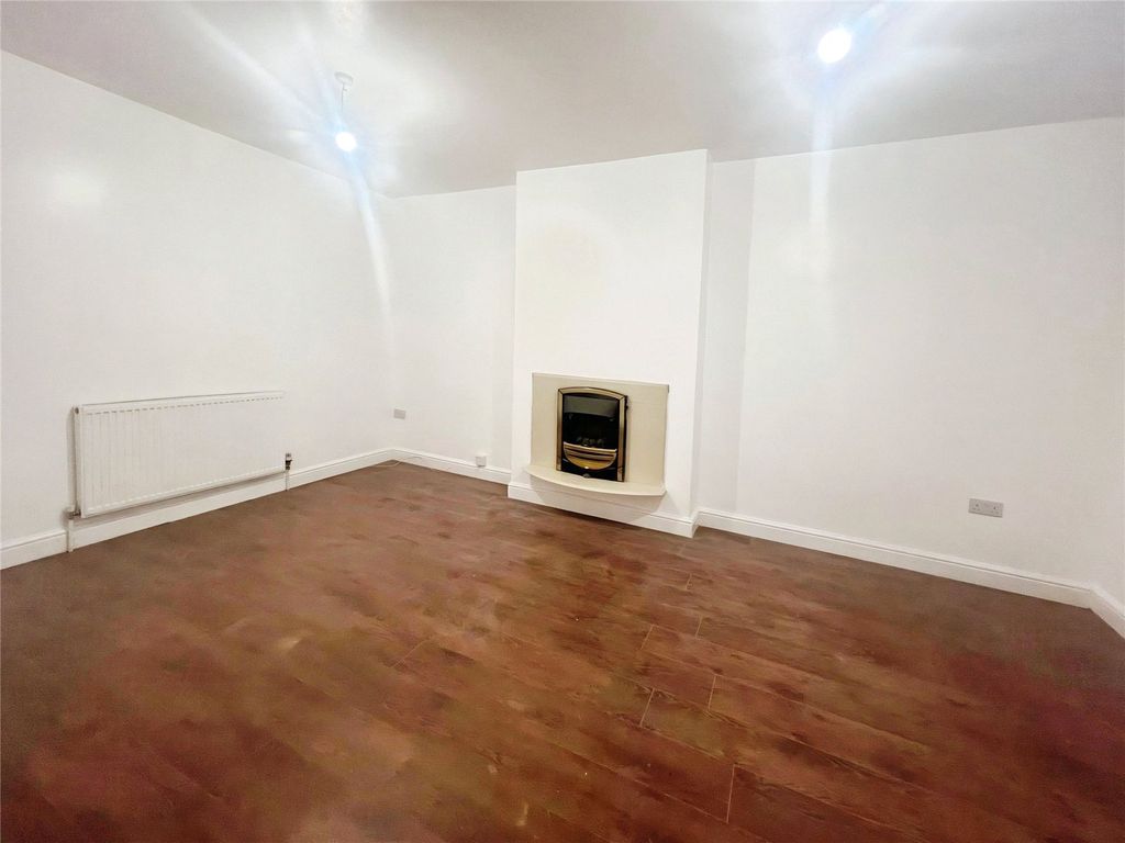 Property photo 3 of 12 Living Room