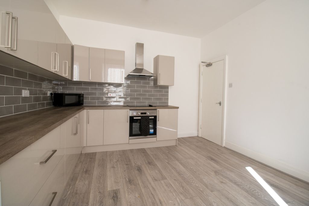 Property photo 3 of 17 Modern Fitted Kitchen With Grey Subway Tile Splash...