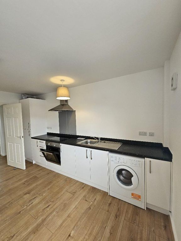 Property photo 3 of 7 Kitchen