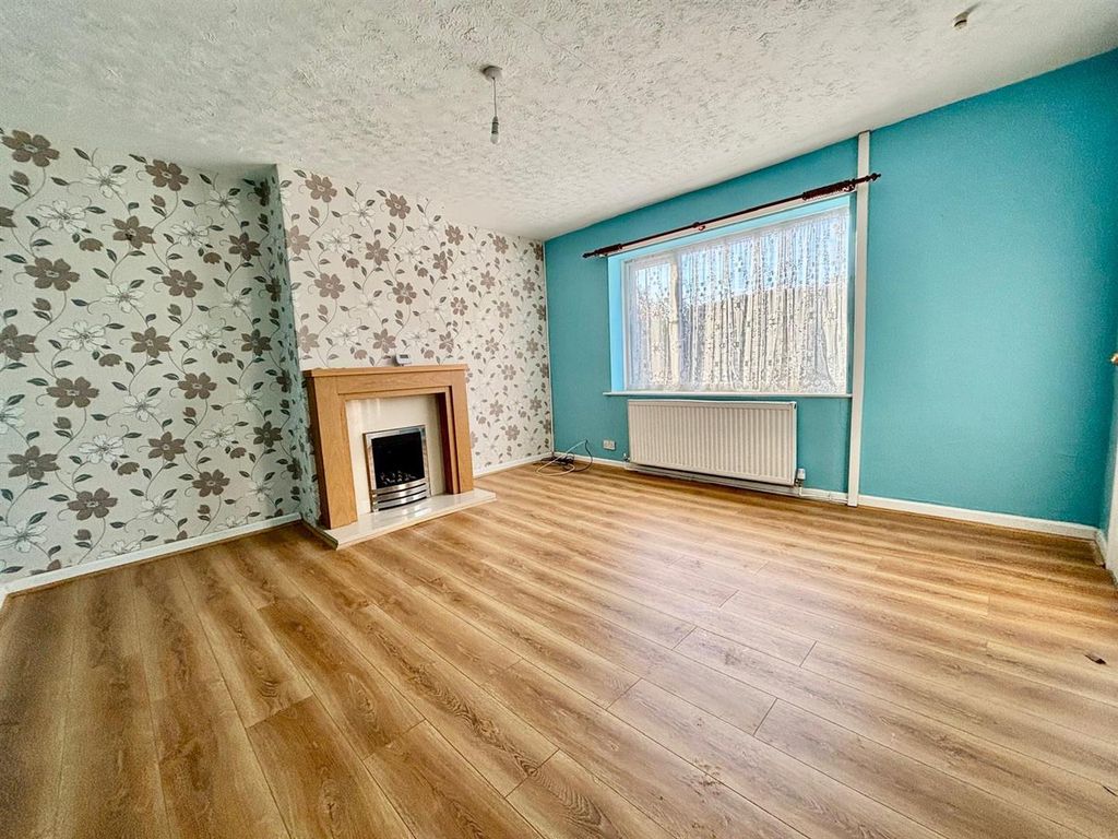 Property photo 2 of 12 Living Room: