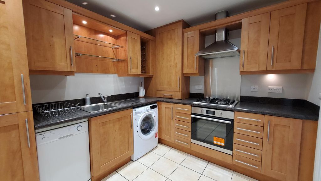 Property photo 2 of 12 Kitchen