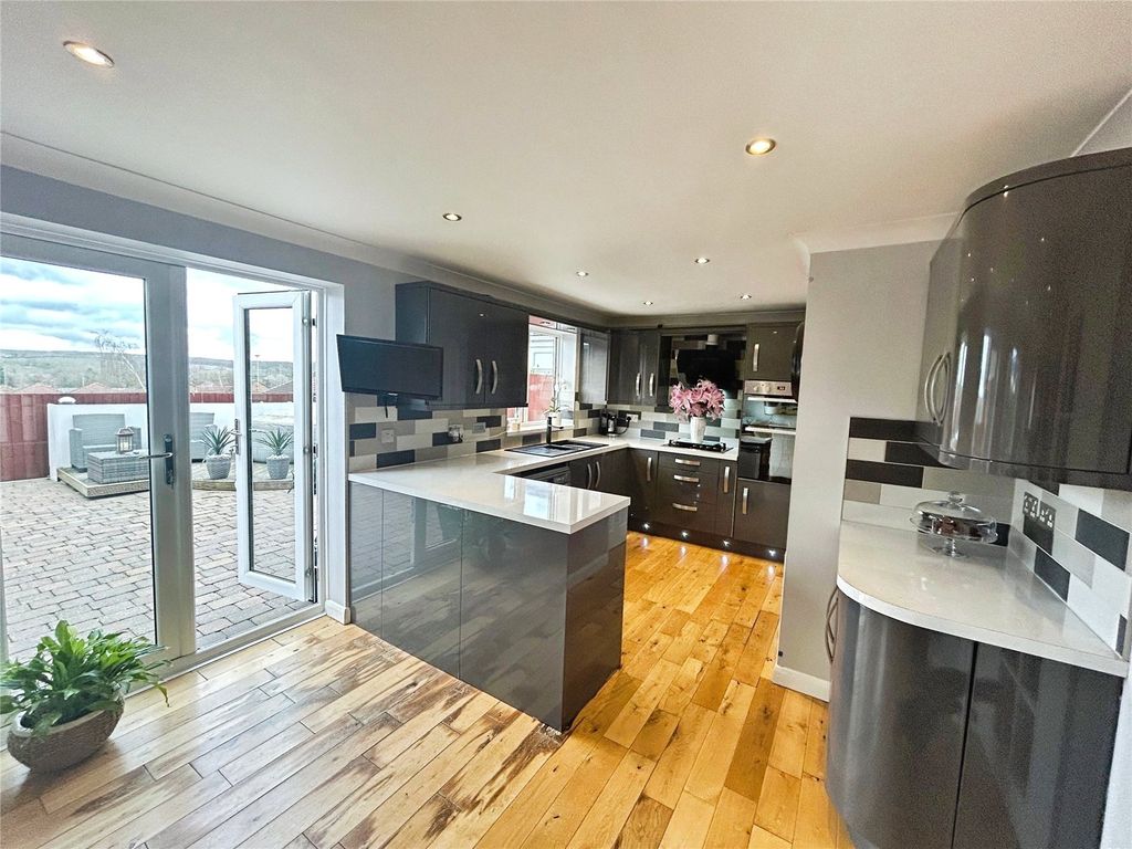 Property photo 2 of 23 Kitchen Area