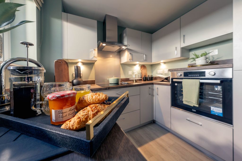 Property photo 2 of 18 Typical Kitchen