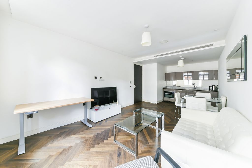 Property photo 1 of 9 Living Are