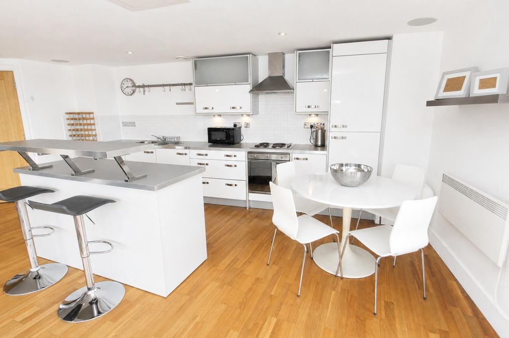 Property photo 2 of 10 Bright Modern Kitchen With Breakfast Bar Island...