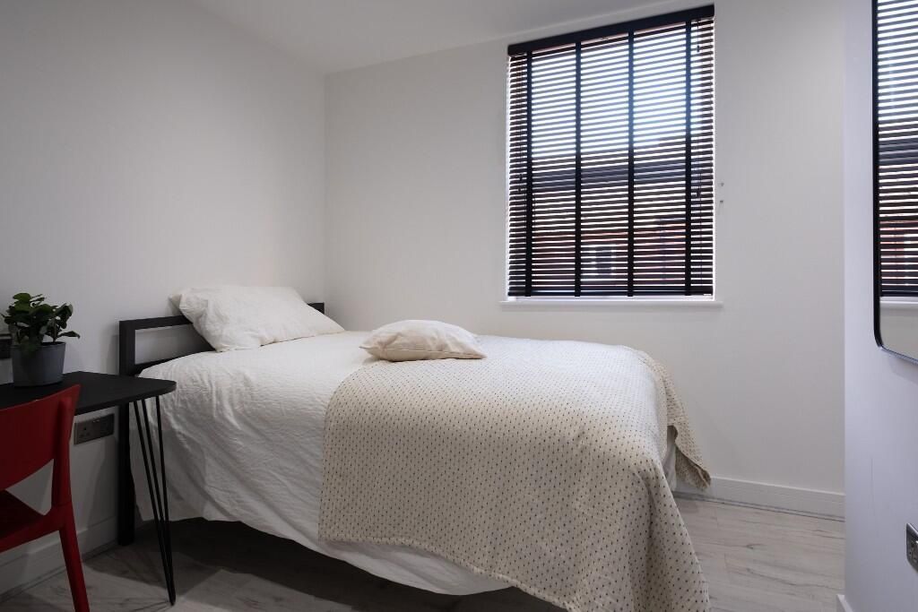 Property photo 2 of 13 A Bright And Welcoming Master Bedroom Featuring A ...